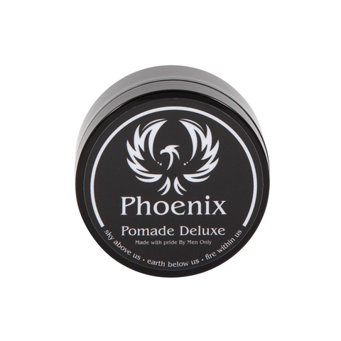 Phoenix Pomade Deluxe op witte achtergrond. Waterbasis pomade met sterke hold, hoge glans en langdurige controle voor een strak of klassiek kapsel.